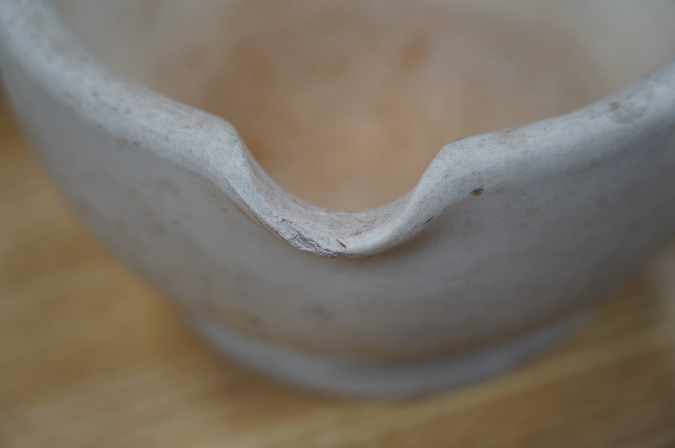 A Wedgwood pestle and a Maw & Sons mortar, 13cm. Condition - fair